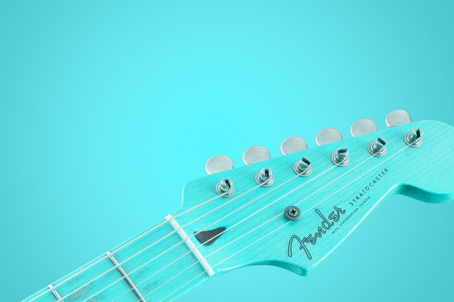 Das Bild zeigt einen Gitarrenkopf in türkis | © Rahul Yadav/Pixabay